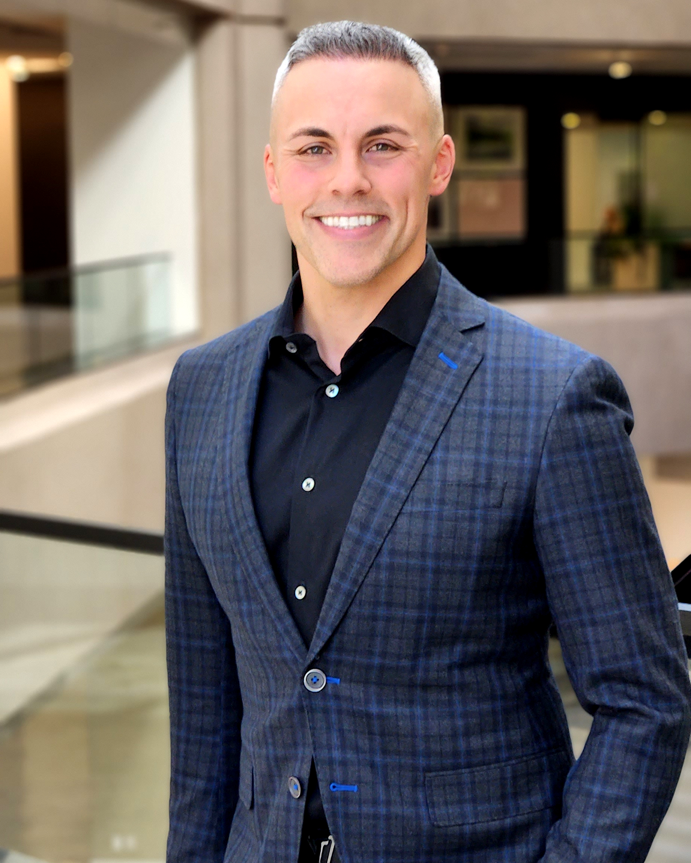 Jarrett Leiker in a blue blazer